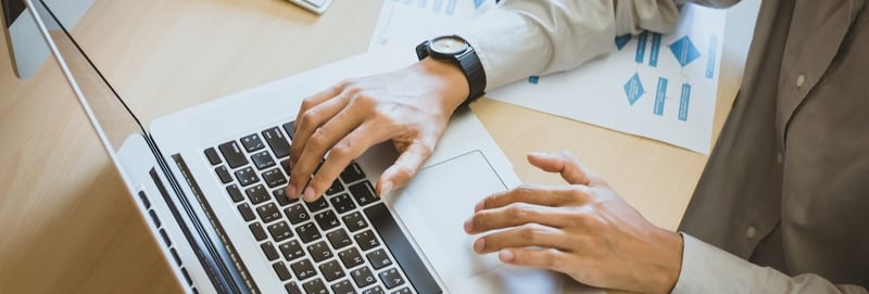 Hand of businessman checking message box on digital laptop 