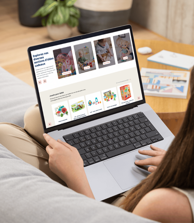 woman on Buropro citation ecommerce website on a computer sitting on a couch