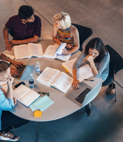 Students studying together at round table