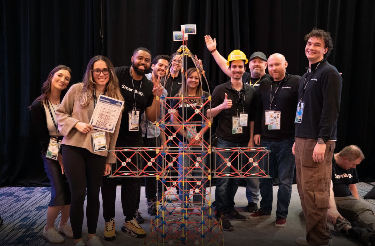 Group of SmartBugs with tower during team building exercise