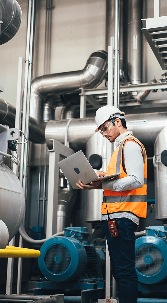 man working on machinery