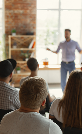 man teaching professional training students