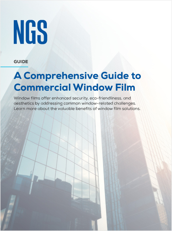 Cover of NGS guide to commercial window films, showcasing skyscrapers and emphasizing security, eco-friendliness, and aesthetics benefits.